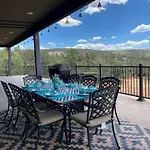 Close To Fresh Creek! Sleeps 12 ~ Amazing Views W/Serene Open Space ~ Hot Tub + Game Room ~ Trails Outside