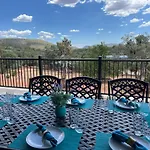 Close To Fresh Creek! Sleeps 12 ~ Amazing Views W/Serene Open Space ~ Hot Tub + Game Room ~ Trails Outside
